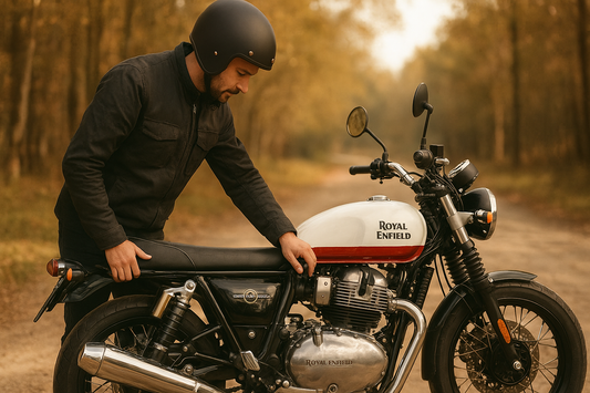 Used Royal Enfield Interceptor 650 being inspected by rider before purchase, featuring genuine Royal Enfield accessories and spares from Torque and Trail.